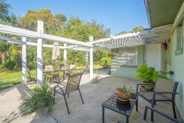 view of patio / terrace featuring a pergola