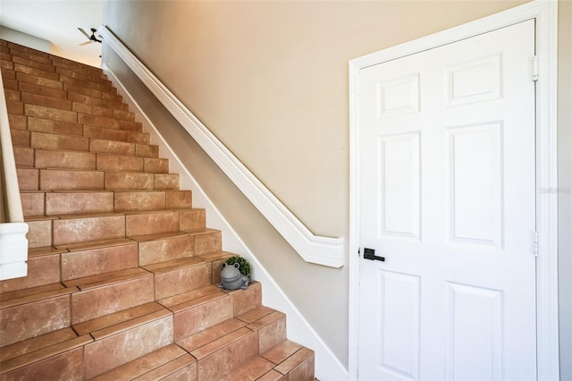 staircase with baseboards