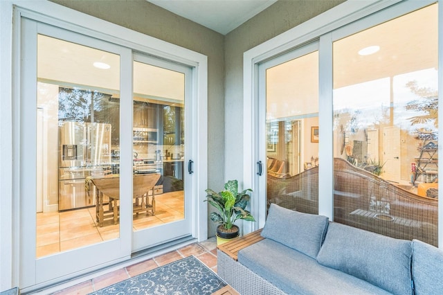 entryway with tile patterned floors