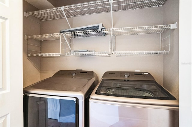 7700 Carriage Homes Dr Unit 4, Orlando, FL 32819 - laundry area featuring laundry area and washing machine and clothes dryer