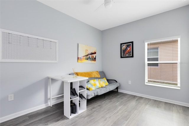 interior space with hardwood / wood-style flooring and ceiling fan