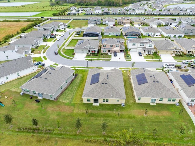 729 Hitch Loop, Saint Cloud, FL 34772 - aerial perspective of suburban area with a large body of water