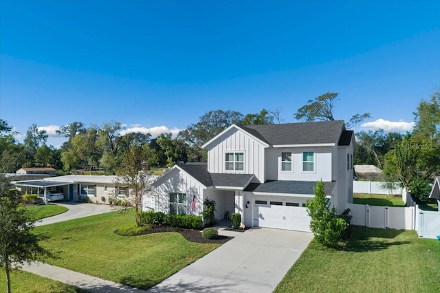 view of front of home featuring a front yard and a garage