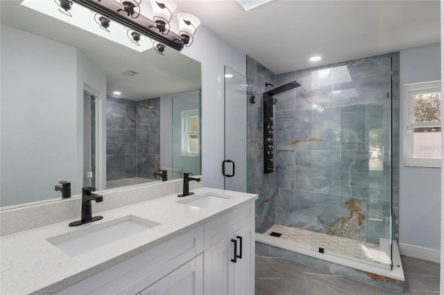 bathroom featuring vanity and an enclosed shower