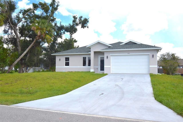 single story home featuring a garage and a front lawn