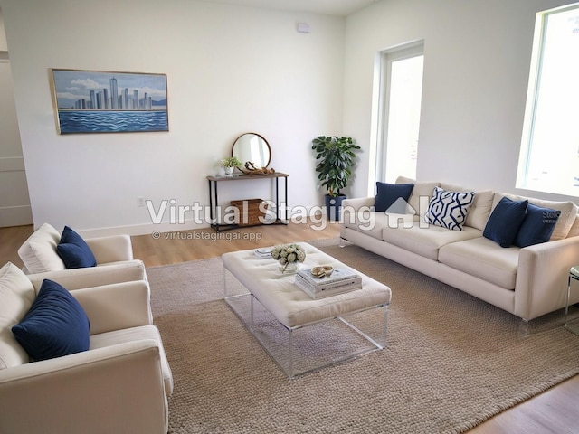 living room with hardwood / wood-style floors and a wealth of natural light