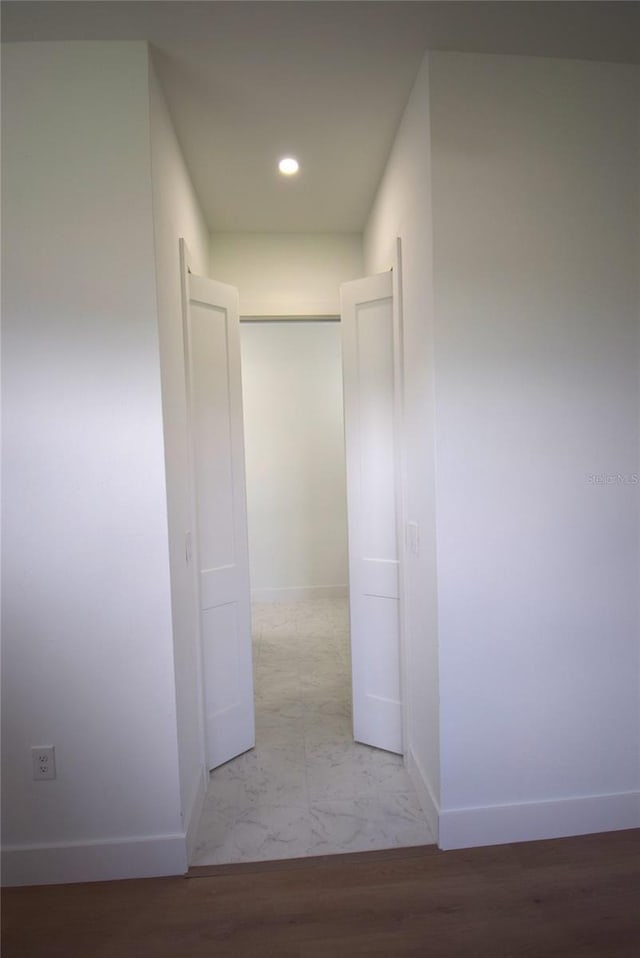 hall featuring light hardwood / wood-style floors