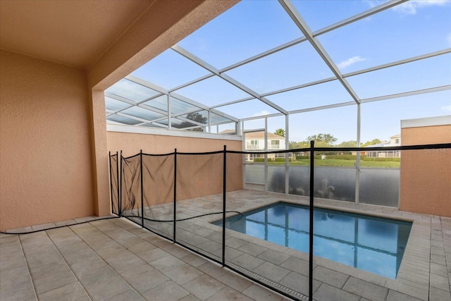 view of pool featuring a lanai