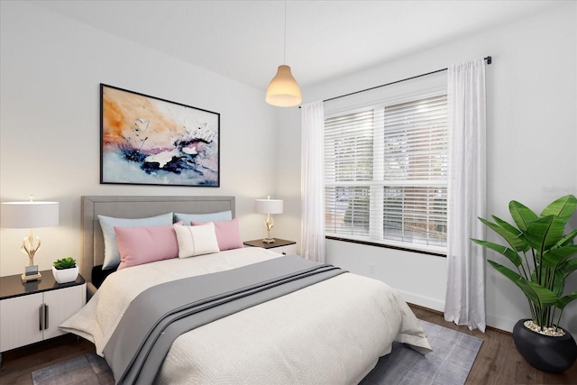 bedroom featuring dark hardwood / wood-style floors