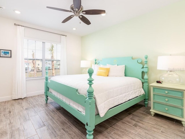 bedroom featuring ceiling fan and hardwood / wood-style floors