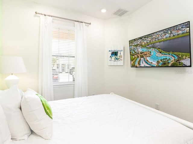 bedroom featuring recessed lighting and visible vents