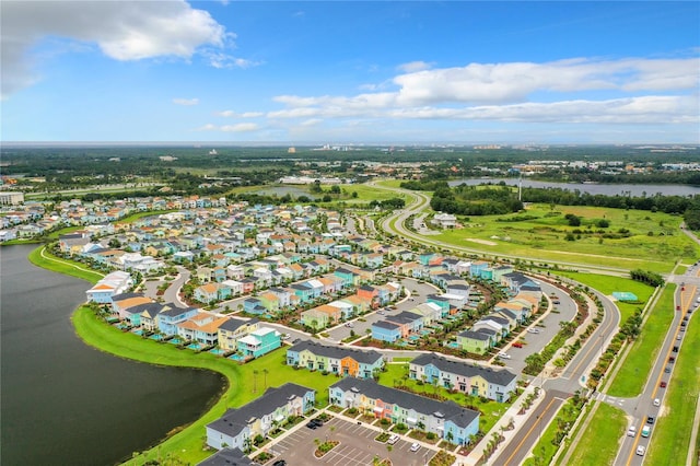 aerial view featuring a residential view and a water view