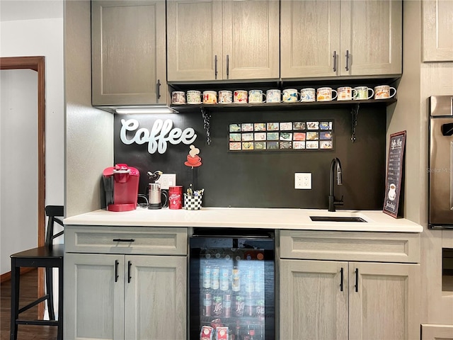 6885 Orchid Tree Dr, Grant, FL 32949 - indoor wet bar with beverage cooler and oven