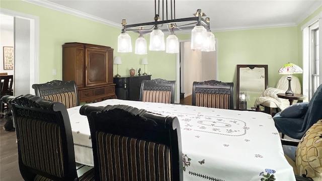 6885 Orchid Tree Dr, Grant, FL 32949 - dining space with ornamental molding and wood finished floors