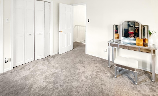 6885 Orchid Tree Dr, Grant, FL 32949 - bedroom with carpet floors, baseboards, and a closet