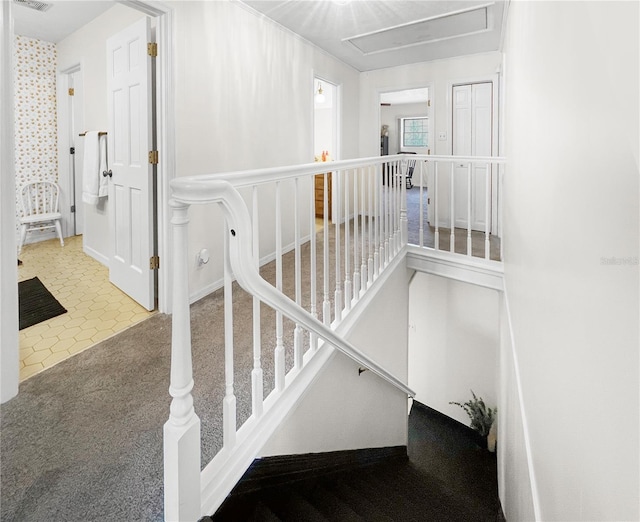 6885 Orchid Tree Dr, Grant, FL 32949 - stairs with carpet floors, attic access, and tile patterned flooring