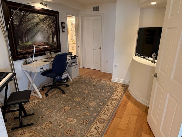 office area featuring light hardwood / wood-style floors