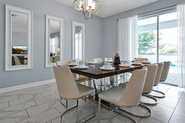 dining room with an inviting chandelier