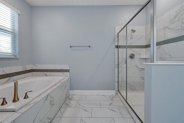 bathroom with shower with separate bathtub