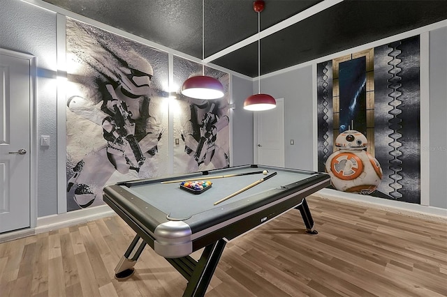 game room with hardwood / wood-style flooring and pool table