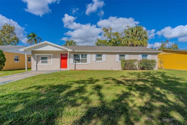 ranch-style home with a front lawn