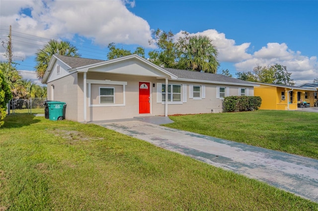 ranch-style home with a front yard