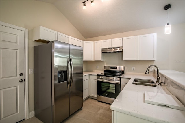 kitchen featuring sink, white cabinetry, stainless steel appliances, and hanging light fixtures