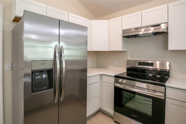 kitchen with exhaust hood, white cabinets, stainless steel appliances, and a textured ceiling