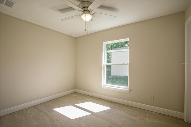 empty room with ceiling fan