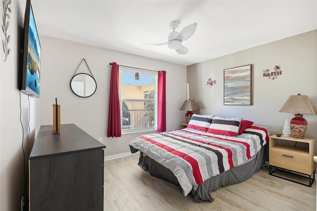 bedroom featuring ceiling fan and light hardwood / wood-style floors