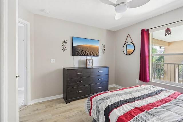 bedroom featuring light wood-type flooring and ceiling fan