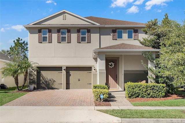 view of front of property featuring a garage