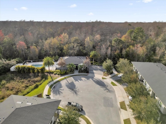 bird's eye view with a view of trees