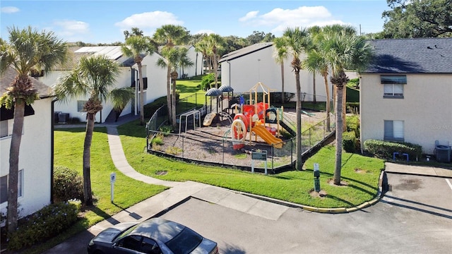 view of play area featuring a lawn