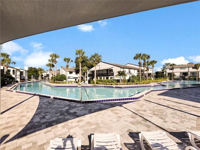 view of pool featuring a patio area