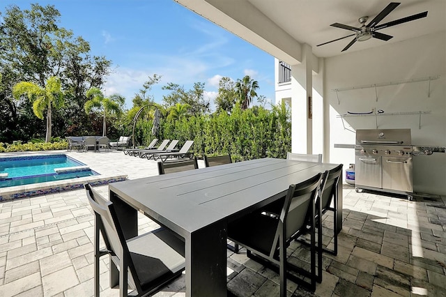 view of patio featuring a grill and ceiling fan