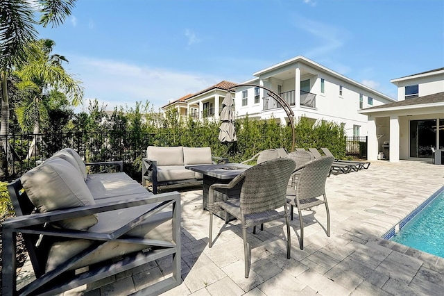 view of patio / terrace with outdoor lounge area and a fenced in pool