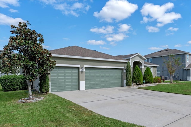 ranch-style home with a front yard and a garage