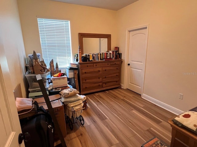 office area with hardwood / wood-style floors