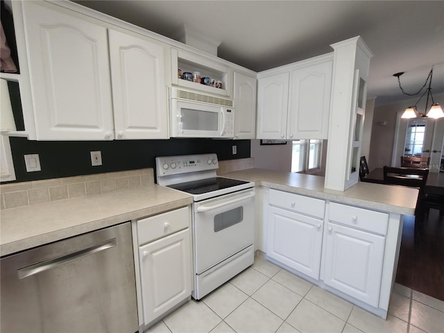 kitchen featuring white cabinetry, white appliances, and light tile patterned floors