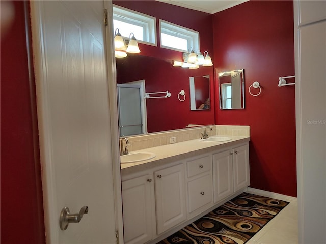 bathroom featuring tile patterned floors and vanity