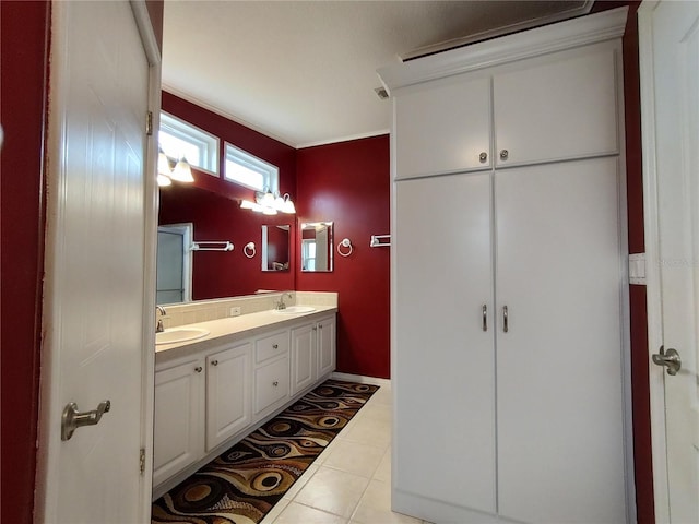 bathroom featuring vanity and tile patterned flooring