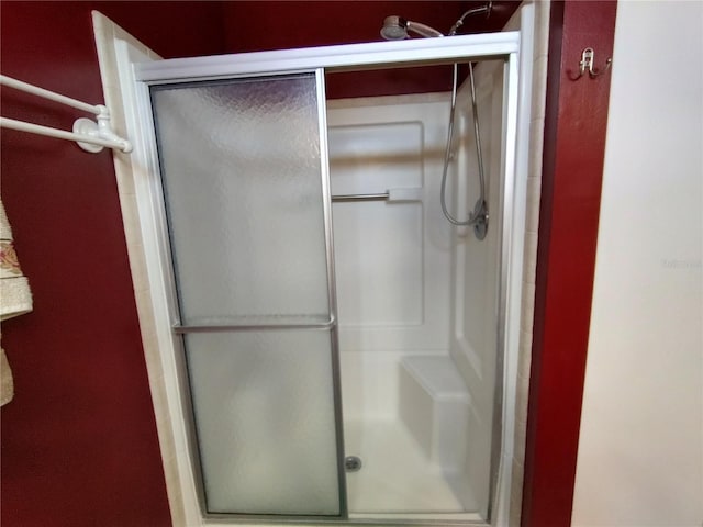 bathroom with an enclosed shower