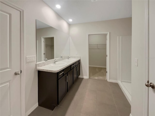 bathroom featuring tile patterned floors and vanity