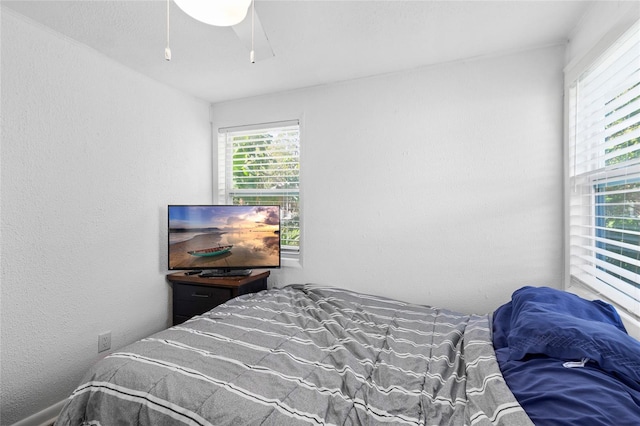 bedroom featuring ceiling fan