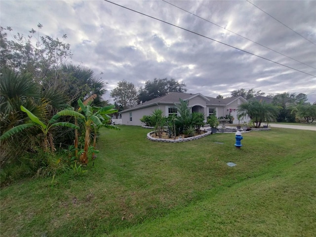 exterior space featuring a front lawn