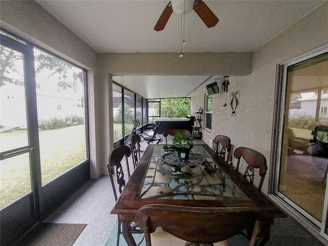 sunroom / solarium with ceiling fan