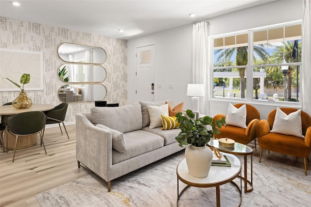 living room with light hardwood / wood-style flooring