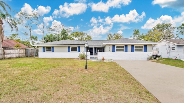 ranch-style house with a front yard