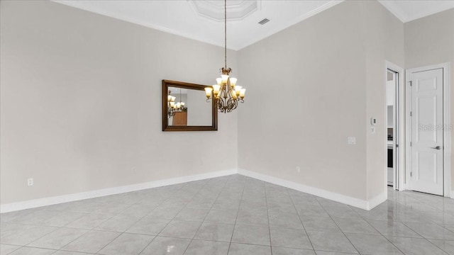 tiled spare room with a towering ceiling and an inviting chandelier